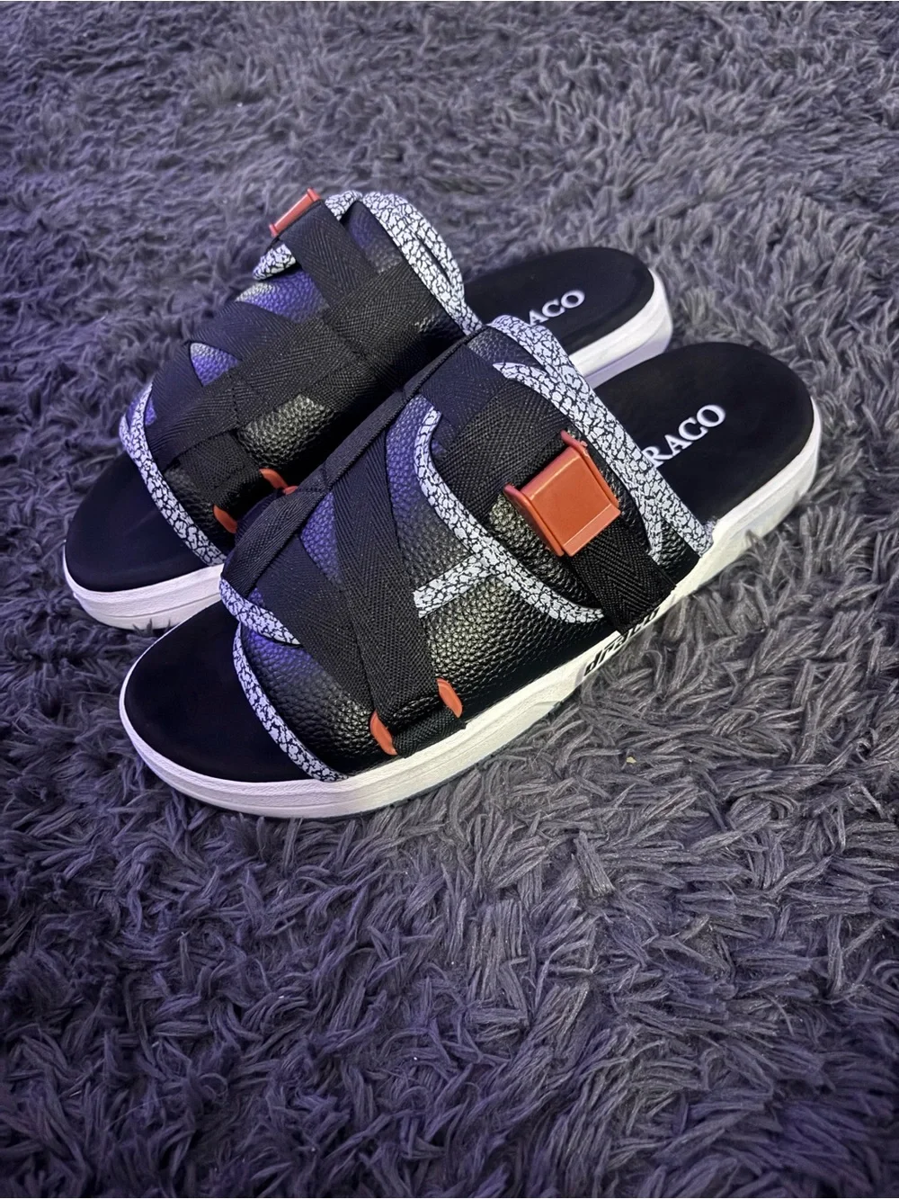 Draco Men’s Black Strap Slide Sandals with White Trim and Orange Accents